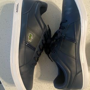 Lacoste small tiny scuff look pic